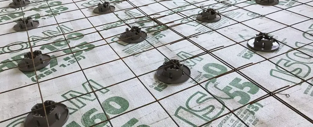 Foam board with metal grid installation.