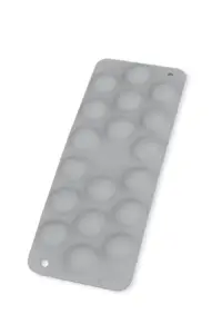 Moule silicone pour macarons, surface alvéolée.