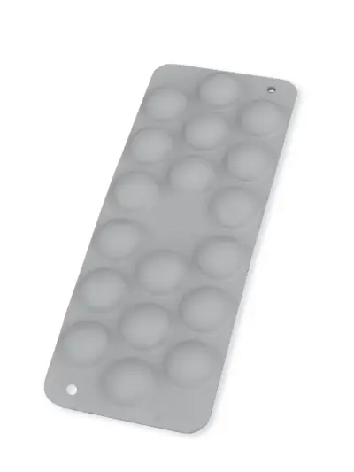 Moule silicone pour macarons, surface alvéolée.